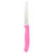 A Victorinox utility knife with a pink handle.