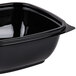 A black Sabert deli bowl with a lid.