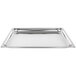A Vollrath stainless steel table pan with a perforated surface.