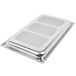 A silver rectangular Vollrath stainless steel tray with holes.