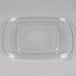 A clear plastic rectangle lid on a clear plastic container.