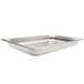 A close-up of a Vollrath stainless steel tray with a large bottom.