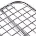 A close up of a Vollrath stainless steel wire pan grate.