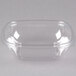 A clear Sabert PET square bowl with a curved edge.