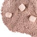 A pile of Swiss Miss hot chocolate powder on a white background.