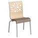 A Grosfillex Tempo outdoor restaurant chair with a beige back and taupe seat with holes in the back.