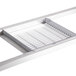 A stainless steel metal rack with a metal grate on it for a Bakers Pride countertop charbroiler.