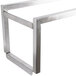 A stainless steel shelf for a Bakers Pride countertop charbroiler with a metal frame.