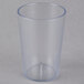 A stack of Carlisle clear plastic tumblers on a white surface.