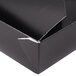 A black paper box with a white edge.