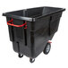 A black plastic bin with red handles.