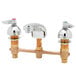 Two T&amp;S brass deck mount faucets with chrome lever handles.