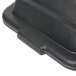 A close-up of a black Rubbermaid hinged dome lid on a black container.