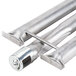 Two stainless steel burner tubes with a metal handle.