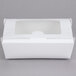A white Bio-Pak paper take-out box with a transparent window lid.