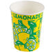 A yellow and green paper cup with a lemon design on it.