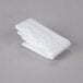 A stack of Real Tuff white plastic laundry bags.