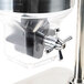 A Bon Chef stainless steel single cereal dispenser with a glass top.