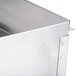 A stainless steel Bakers Pride Dante Series splashguard with a handle.