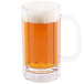 A white Carlisle plastic beer mug filled with beer and foam.