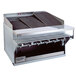 A Bakers Pride stainless steel heavy duty commercial charbroiler with 12 burners.