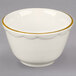 A white bowl with a gold rim.