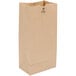 A bundle of brown Duro paper bags with handles.