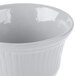 A gray cast aluminum bowl with a rippled design.