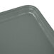 A close up of a rectangular Cambro tray in gray.