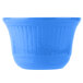 A cobalt blue cast aluminum bowl with a rippled surface.