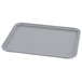 A rectangular pearl gray Cambro tray on a counter.