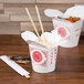 Two SmartServ Chinese take-out boxes with chopsticks and food.