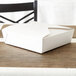 A white Fold-Pak Bio-Pak take-out box on a table.