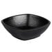 An Elite Global Solutions black melamine square bowl with a black rim.