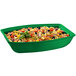 A green Tablecraft rectangular cast aluminum salad bowl with food inside.