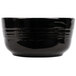 A black Tablecraft cast aluminum bowl with a handle.