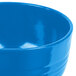 A Tablecraft sky blue cast aluminum fruit bowl.