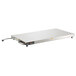 A white rectangular stainless steel Vollrath heated shelf with a power cord.