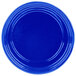 A cobalt blue Tablecraft cast aluminum souffle bowl with ridges on the rim.