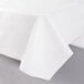 A white tablecloth on a table.
