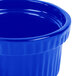 A Tablecraft cobalt blue cast aluminum souffle bowl.