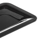 A black Carlisle 1/3 size food pan with a shiny edge.