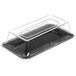 A black melamine food pan with a clear lid on a counter.