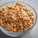 A bowl of Regal Roasted Unsalted Peanut Halves.