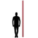 A silhouette of a man standing next to a red Aarco lumber post.