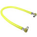 A yellow T&S gas connector hose with swivel link fittings and 90 degree elbows.