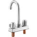 A chrome Regency deck-mount faucet with two silver knobs.