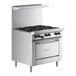 A large stainless steel Garland liquid propane range with 6 burners and a standard oven.