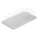 A white melamine food pan with a clear lid.
