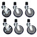 A set of six Eagle Group zinc swivel stem casters with rubber wheels.